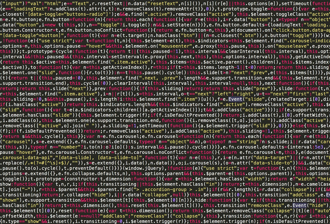 Home Vibrant and detailed view of JavaScript code on a screen, ideal for tech and programming visuals.